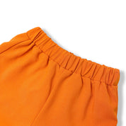 Orange Ruffle Hem Shorts